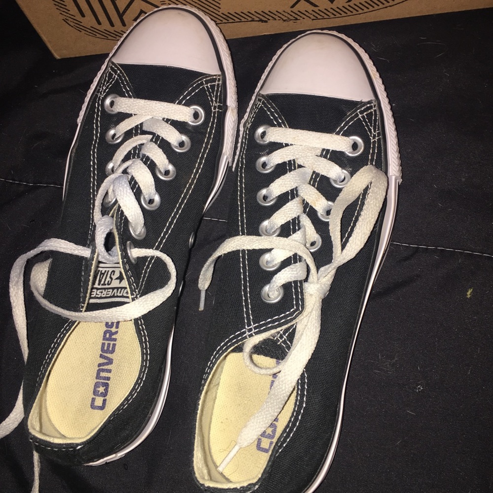 Low top black and white converses